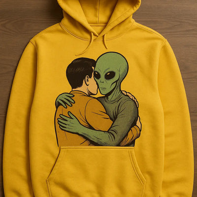 Custom printed yellow hoodie with a human hugging a friendly alien