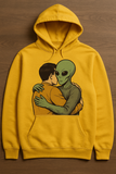 Prompt: A Yellow hoodywhich has a design of a human hugging an alien.