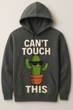 Prompt: a realistic of a hoodie having an image “A cactus wearing sunglasses saying ‘Can’t Touch This'