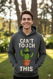 Prompt: a realistic of a hoodie having an image “A cactus wearing sunglasses saying ‘Can’t Touch This'